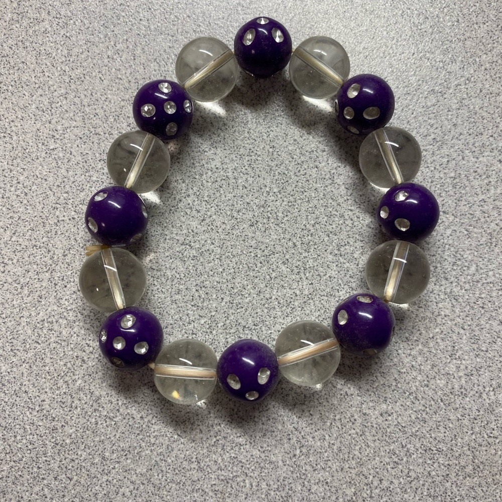 Purple and clear beaded bracelet